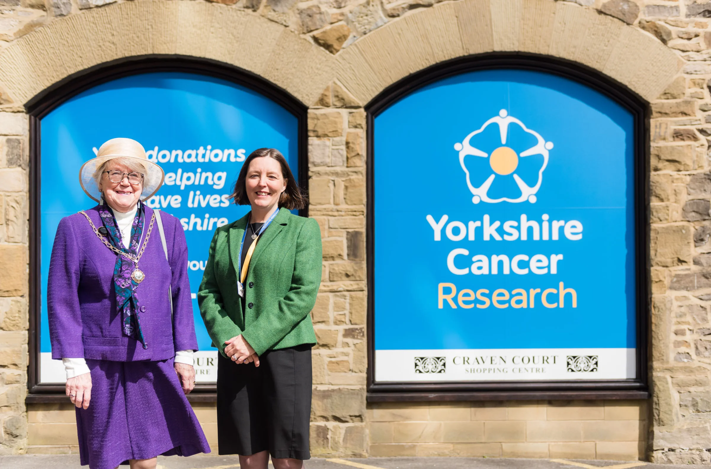 Yorkshire Cancer Research Chief Executive and Skipton Councillor standing outside the new Skipton Shop
