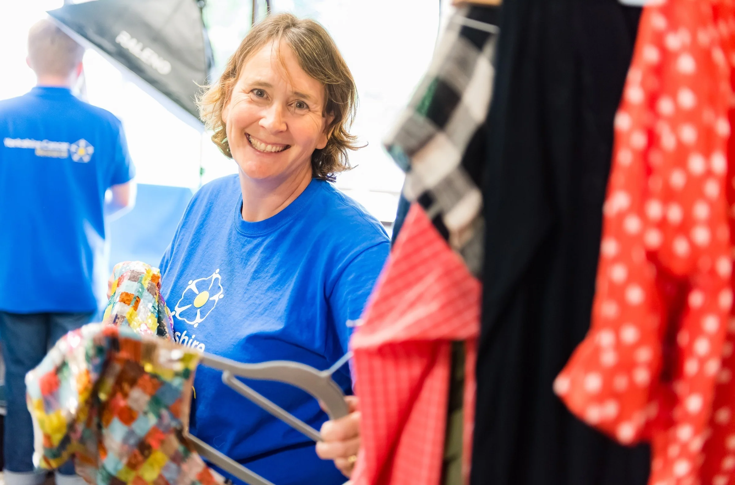 Yorkshire Cancer Research volunteer sorting donations from supporters