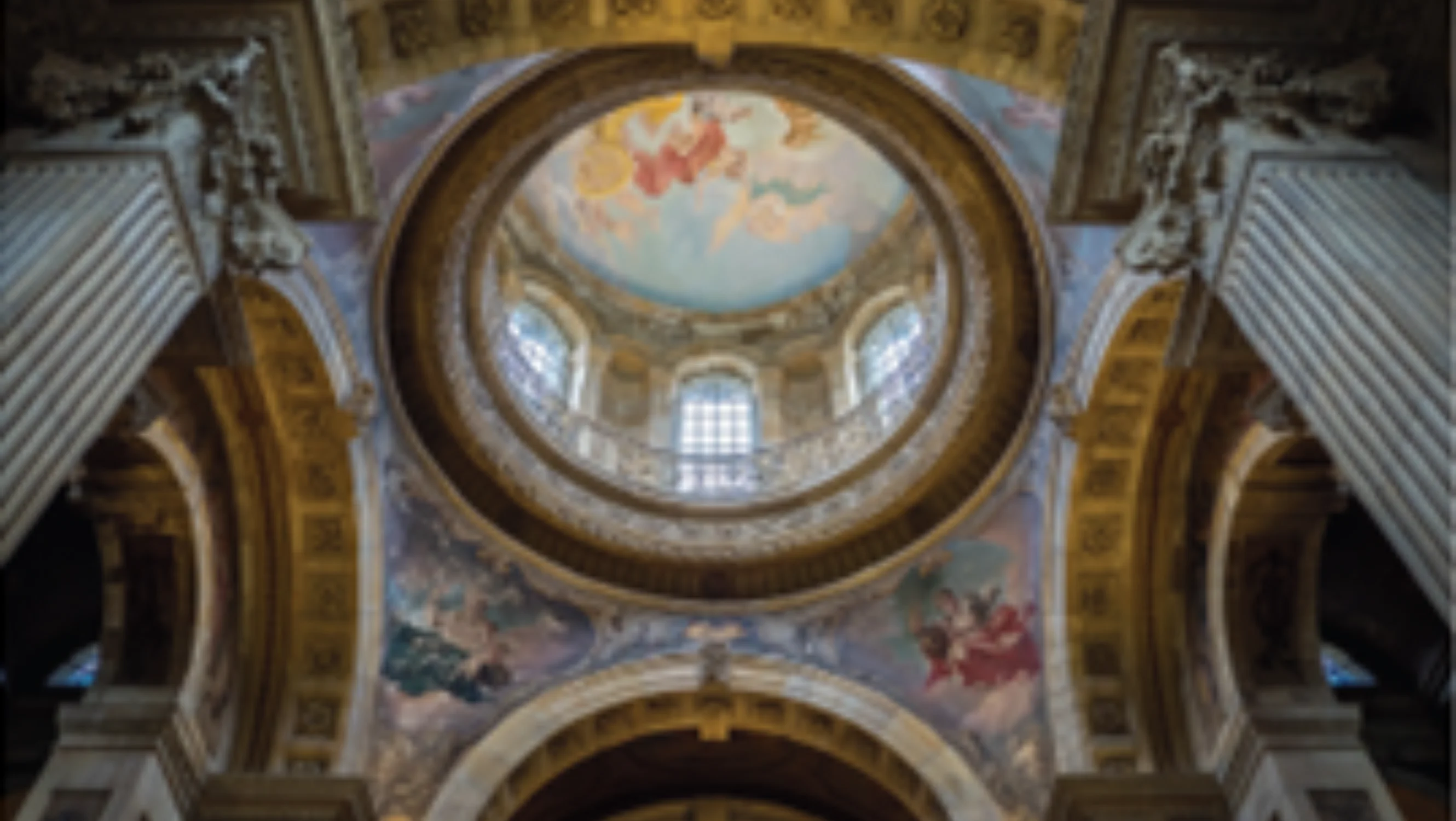 A grand feature ceiling from inside a stately home
